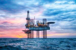 Wealth Management for Energy Executives represented by an image of an off seas drilling platform