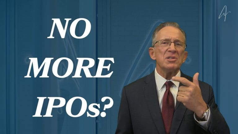 Man in suit and glasses gestures while speaking, with text NO MORE IPOs? on blue background.