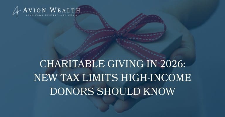 Hands holding a wrapped gift with red ribbon, representing charitable giving tax changes for high-income donors in 2026