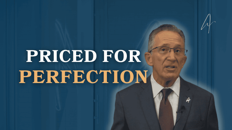 Man in navy suit and tie speaking on a blue background beside the text Priced for Perfection